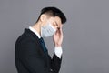 Young man wear medical mask and  headache  concepts Royalty Free Stock Photo