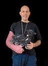 Young man wearing an arm cast after a skating accident Royalty Free Stock Photo