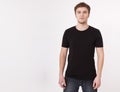 Young man wearing blank t-shirt isolated on white background. Copy space. Place for advertisement. Front view Royalty Free Stock Photo