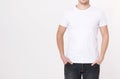 Young man wearing blank white t-shirt isolated on white background. Copy space. Place for advertisement Royalty Free Stock Photo