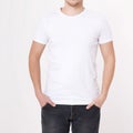 Young man wearing blank white t-shirt isolated on white background. Copy space. Place for advertisement Royalty Free Stock Photo