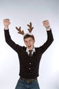 Young man wearing deer's horns