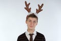 Young man wearing deer's horns Royalty Free Stock Photo