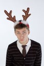 Young man wearing deer's horns