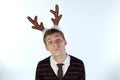 Young man wearing deer's horns