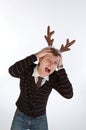 Young man wearing deer's horns Royalty Free Stock Photo