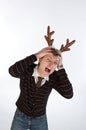 Young man wearing deer's horns