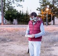 Young man wearing drone glasses and controlling the drone with a remote Royalty Free Stock Photo