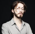 Young man wearing eyeglasses over black background. Lifestyle concept. Royalty Free Stock Photo