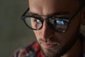 Young man wearing glasses on color background, closeup. Royalty Free Stock Photo