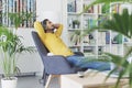 Young man wearing headphones and listening to music Royalty Free Stock Photo