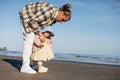 Young man wearing jacket on baby Royalty Free Stock Photo