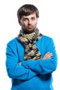 Young man wearing scarf and sweater