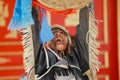 Young man wearing shaman`s costume performs traditional ceremony in Ulaanbaatar, Mongolia.