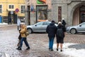 Young man wearing shorts, during walk in the city