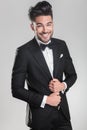 Young man wearing a tuxedo smiling Royalty Free Stock Photo