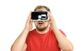 Young man wearing virtual reality googles / VR Glasses Royalty Free Stock Photo