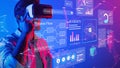 Young man wearing virtual reality headset exploring digital charts and graphs in futuristic data analysis environment Royalty Free Stock Photo