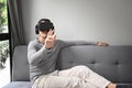 Young man wearing virtual reality headset and playing video game or watching movie at home Royalty Free Stock Photo