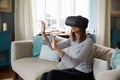 Young Man Wearing Virtual Reality Headset In Studio Royalty Free Stock Photo