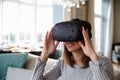 Young Man Wearing Virtual Reality Headset In Studio Royalty Free Stock Photo