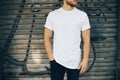 Young man wearing white blank t-shirt and blue Royalty Free Stock Photo