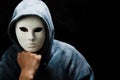 Young man wearing white mask and hood Royalty Free Stock Photo