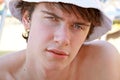 The young man and a white cap Royalty Free Stock Photo