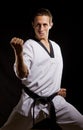 A young man in white kimono ready to fight Royalty Free Stock Photo