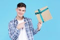 Young man male isolated on blue background Royalty Free Stock Photo