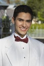 Young Man In White Tuxedo At Quinceanera