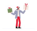 Young man in winter clothes smiles and holds gifts. Christmas celebration concept