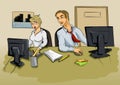 Young man and woman in the office in front of the computer