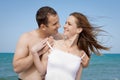 Young man and woman at the sea Royalty Free Stock Photo