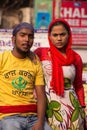 Young man and woman standing at Chandni Chowk in New Delhi, India