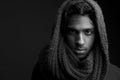 Young man with wool scarf covering head Royalty Free Stock Photo