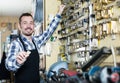 Worker displaying result of his key shaping Royalty Free Stock Photo