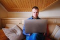 Young man working absorbed on laptop at home Royalty Free Stock Photo