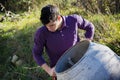 Young man working with a cement mixer Royalty Free Stock Photo