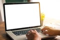 A young man working on his laptop, rear view of business man hands busy using laptop at office Royalty Free Stock Photo