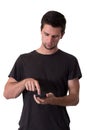 Young Man Working On His Smartphone Royalty Free Stock Photo