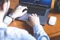 Young man in shirt working from home