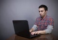 Young man working on laptop