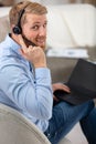 young man working remotely from home Royalty Free Stock Photo