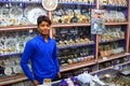 Young man working in a souvenir shop in Taj Ganj neighborhood of