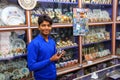 Young man working in a souvenir shop in Taj Ganj neighborhood of