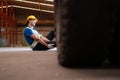 Young man working in a steel industry factory. Royalty Free Stock Photo