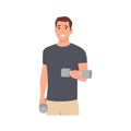 Young man workout using dumbbells doing bicep curl Royalty Free Stock Photo