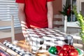 Young man wrapping Christmas presents Royalty Free Stock Photo