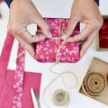 Young man wrapping a gift Royalty Free Stock Photo